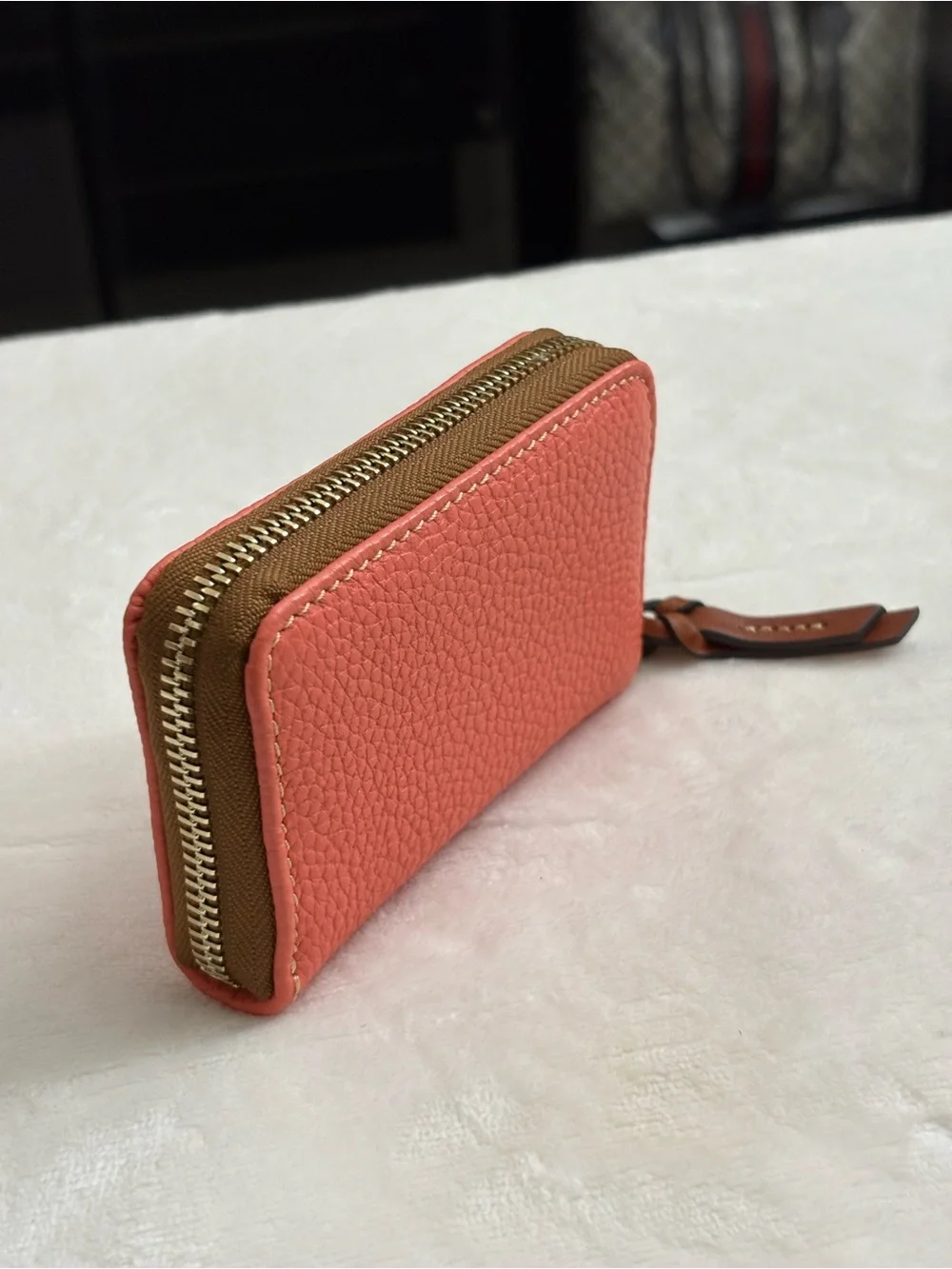Dooney & Bourke Pebble Grain Large Zip Around Credit Card Case  Coral Color.